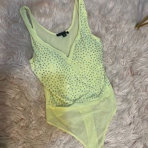 Yellow sparkly bodysuit